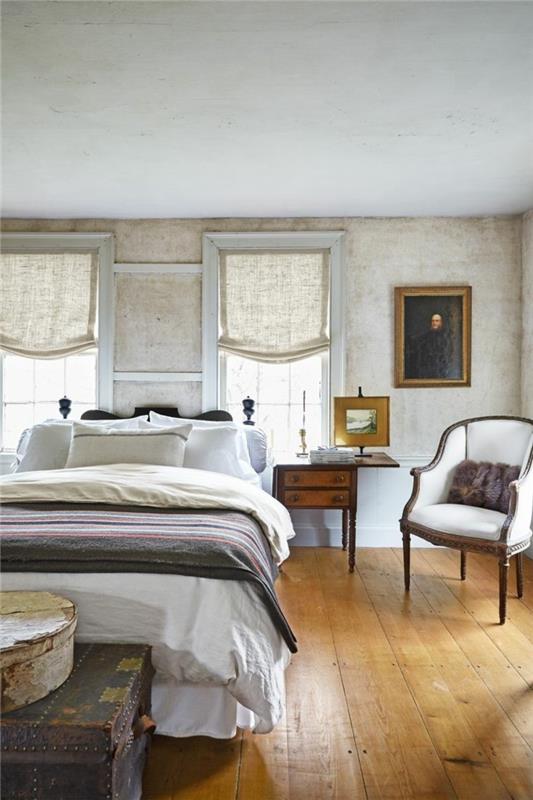 sypialnia w stylu rustykalnym przestronna sypialnia z drewnianą podłogą