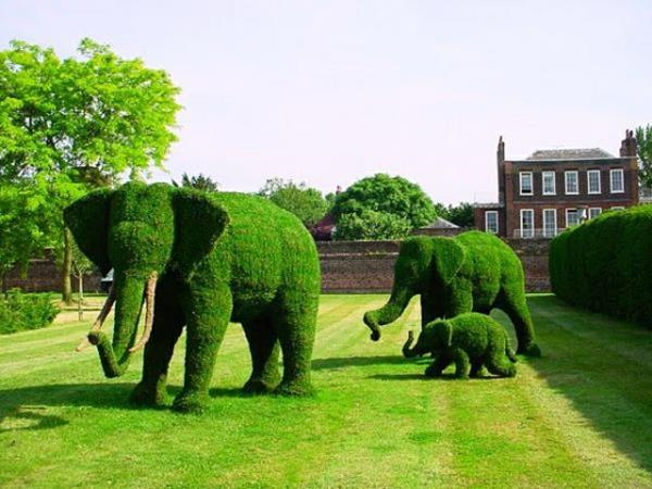 paysage jardin sculptures personnages de dessins animés éléphants