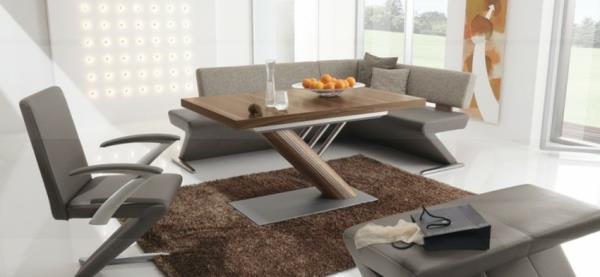 salle à manger moderne avec des meubles rembourrés gris