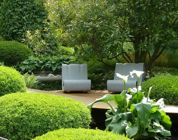 nowoczesne ogrody zdjęcia przykłady projektowania ogrodu krzew zielony