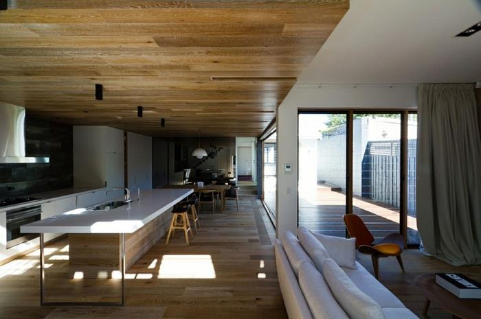 nowoczesne wyposażenie wnętrz drewniana podłoga drewniany sufit otwarty plan