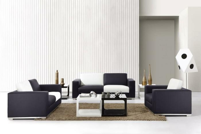 nowoczesne wnętrze salon białe ściany czarne meble do siedzenia