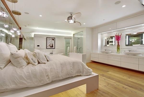 nowoczesna luksusowa willa na otwartym planie sypialnia i łazienka