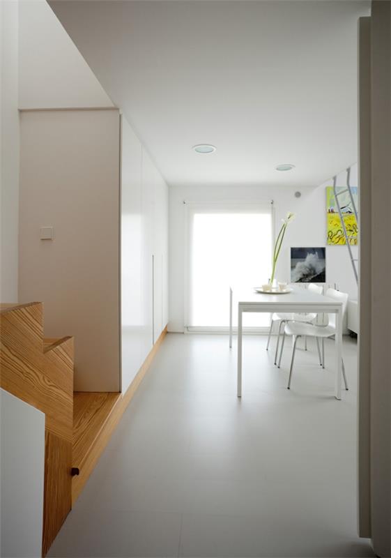 villa moderne en espagne design d'intérieur surfaces brillantes salle à manger blanc