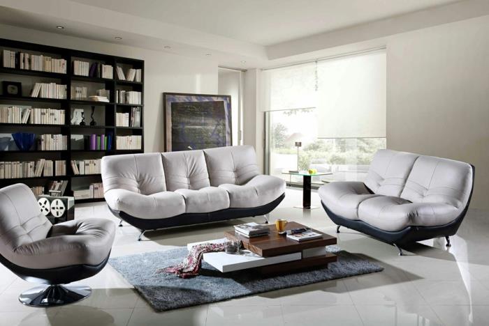 meubles de salon modernes fauteuils confortables tapis gris système d'étagères ouvert