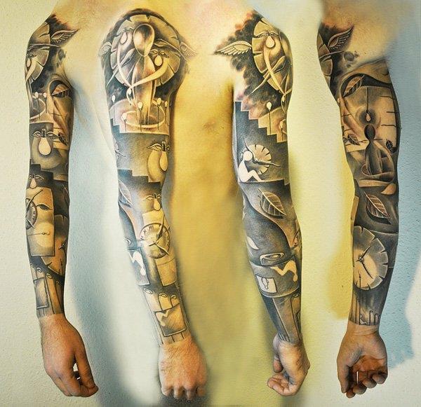 tatuaż na ramieniu plemienne kwiaty
