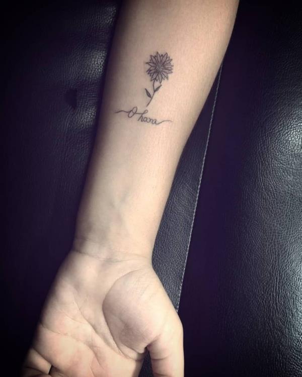 ohana tatouage avant-bras police fleur