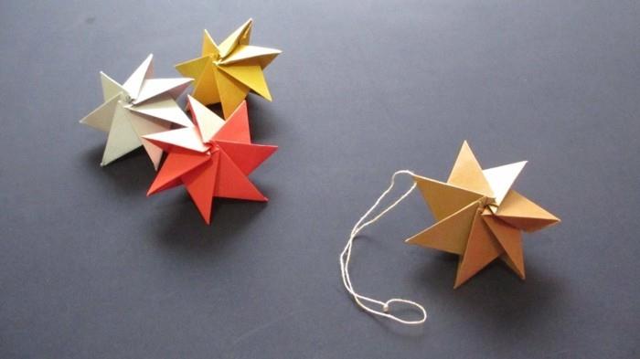 origami noël pliage poinsettia instructions étoiles