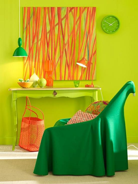 aranżacja wnętrz w kolorach pomarańczowo-zielona ozdoba fotela