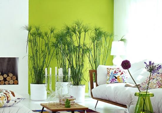 aranżacja wnętrz w kolorach biała zielona sofa salon