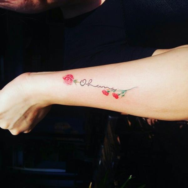 tatouage ohana de l'avant-bras roses