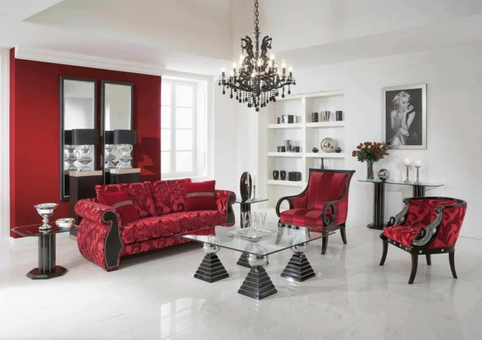 canapés rouges salon de luxe table basse en verre