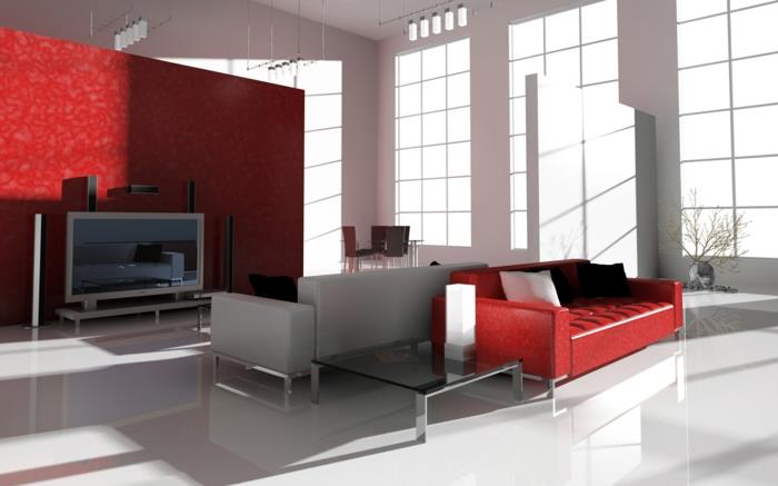 canapés rouges salon mur d'accent rouge table basse en verre