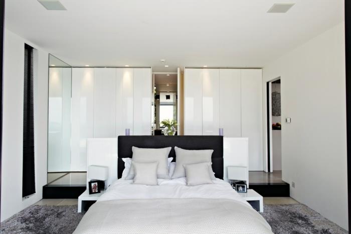 chambre à coucher tapis gris blanc armoire moderne tête de lit noir
