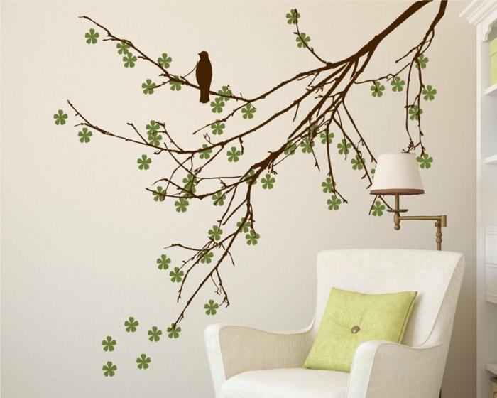 beaux stickers muraux branches d'arbres fleurs fauteuil vert coussins