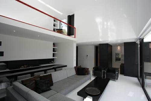eleganckie wnętrze czerwone szyny sofa na drugim piętrze