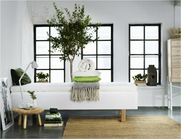 meble skandynawskie łóżko do sypialni dywan z rattanu rośliny doniczkowe skandynawski design