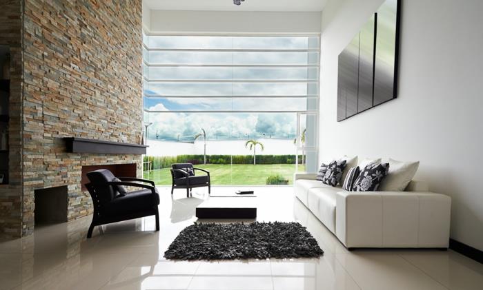 mur de pierre salon cheminée moderne canapé blanc fenêtre d'image