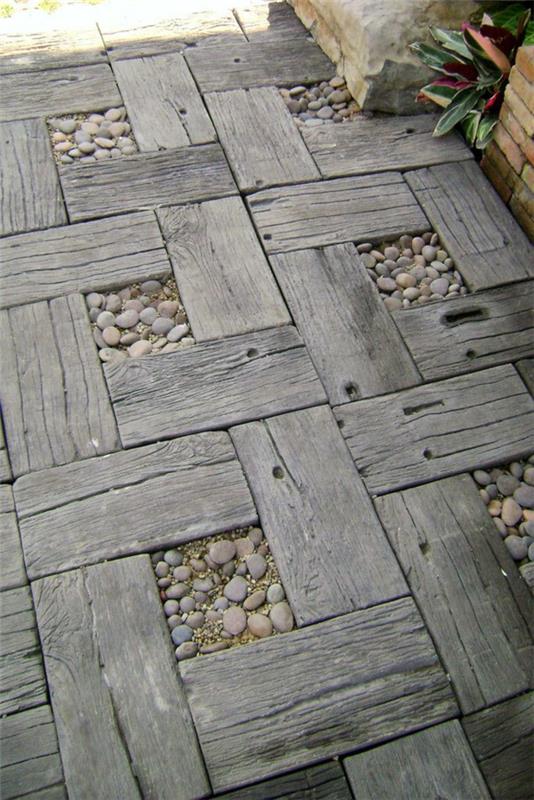 Terrasse couverte de galets de bois disposés en tuiles