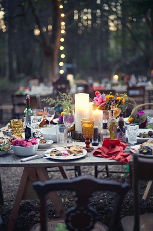 dekoracje stołu świece ogrodowe na imprezę kwiaty oświetlenie ogrodowe