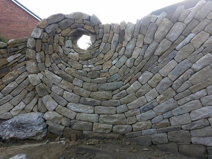 mur de pierres sèches pierres naturelles maçonnerie maçon artiste
