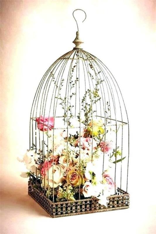 pomysł na dekorację klatki dla ptaków dekoracja stołu wesele