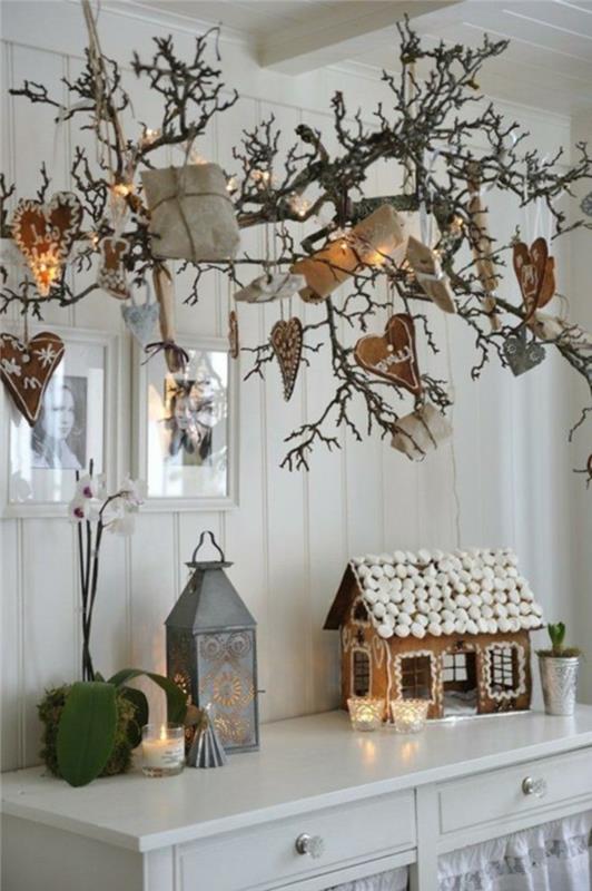 idées de décoration de noël branches d'arbres scandinaves lumière rustique cosy