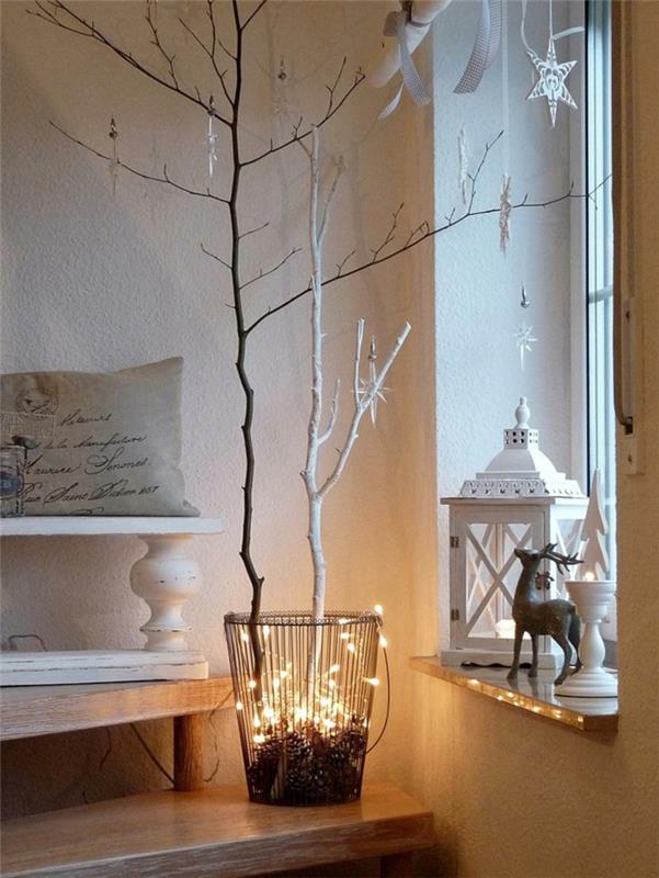 idées de décoration de noël brindilles scandinaves guirlandes lumineuses poinsettias