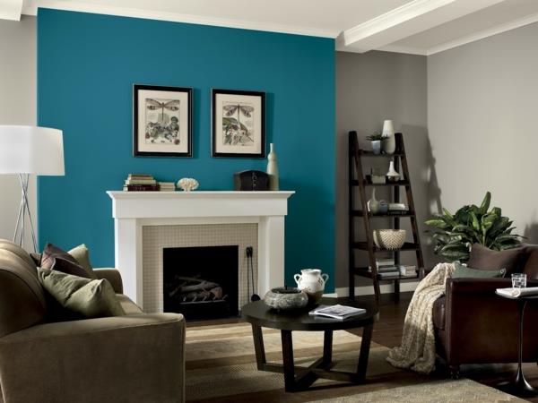 pomaluj ściany pomysły salon surowy kolor niebieski kominek