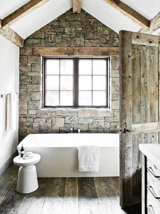 żywe pomysły stare drewniane belki kamienna ściana łazienka wanna rustykalna