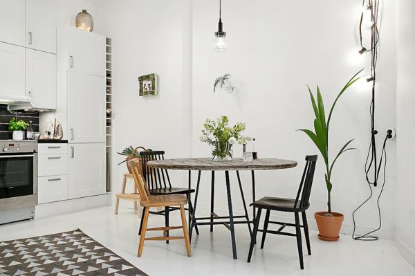 mieszkanie skandynawski design otwarty salon jadalnia kinkiety lampa wisząca