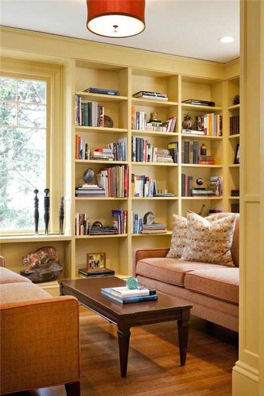 wyposażenie domu biblioteka domowa regał żółty poduszki na sofę
