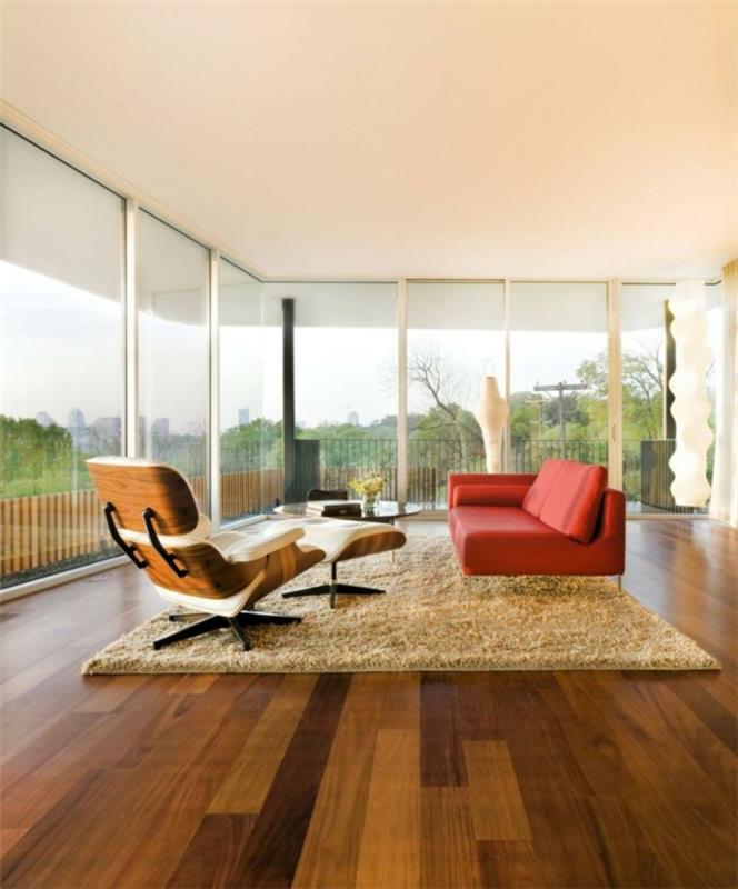 exemples d'ameublement de salon canapé orange minimaliste tapis beige fenêtre panoramique