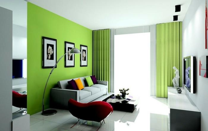 idées de décoration de salon mur d'accent vert coussins colorés